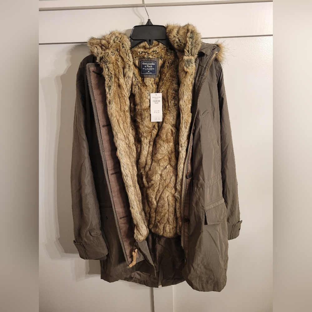 Two piece jacket, shell with reversible vest